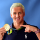 Swimmer Ryan Lochte poses for a photo with his gold medal on the Today-show set on Copacabana Beach in Rio de Janeiro on Aug. 12, 2016.
Harry How/Getty Images